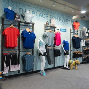 interior photo of the running well store in kansas city featuring men's and women's workout clothes